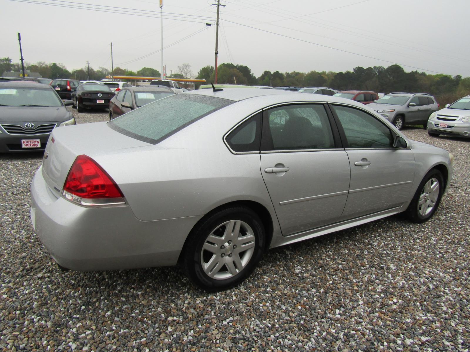 2014 Silver Chevrolet Impala LT (2G1WB5E30E1) with an 3.6L V6 DOHC 16V FFV engine, Automatic transmission, located at 15016 S Hwy 231, Midland City, AL, 36350, (334) 983-3001, 31.306210, -85.495277 - Photo #7